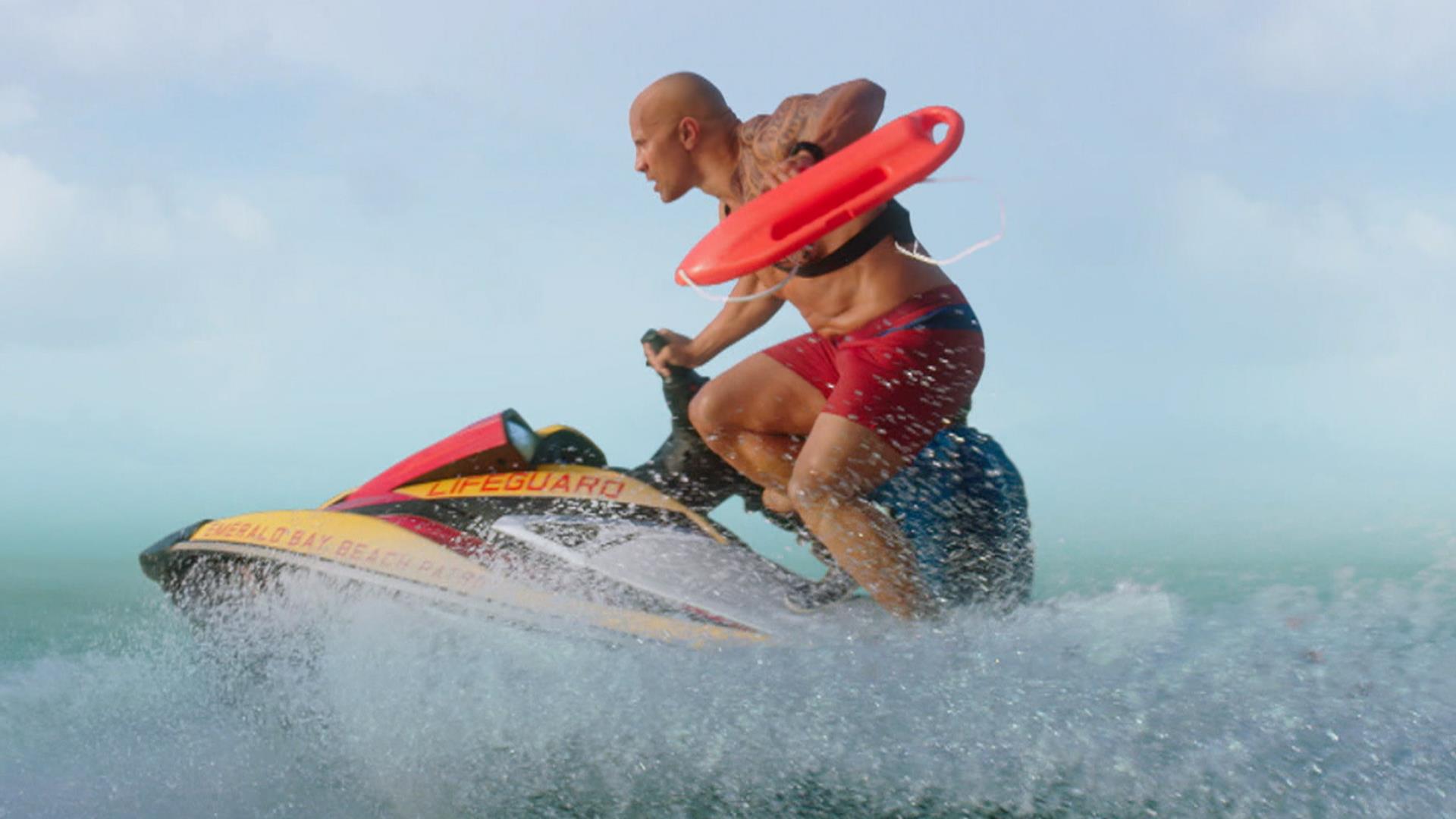 This teaser for the 'Baywatch' trailer starring Dwyane Johnson looks irresistible