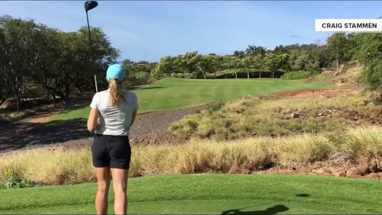 Watch this couple's Hawaiian honeymoon get better with epic hole in one