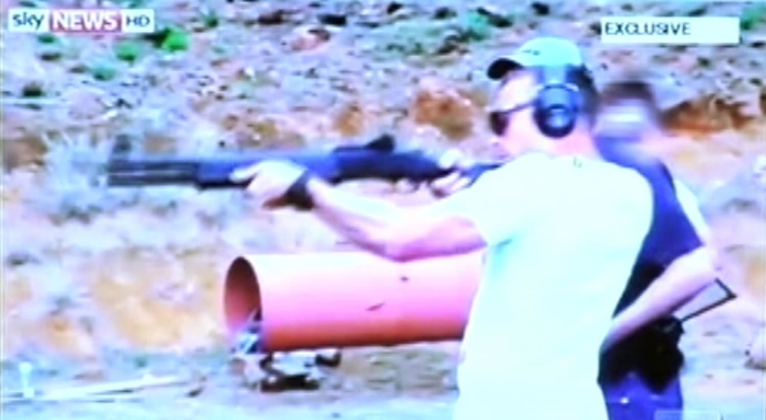 Image: Oscar Pistorius fires a weapon at a shooting range in a video shown to the court during his murder trial in Pretoria.