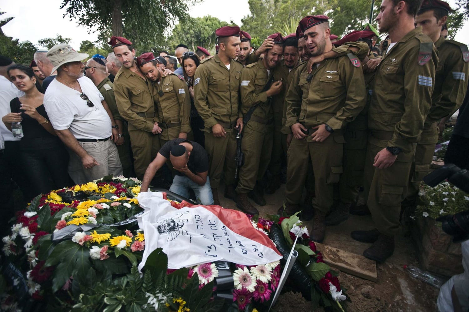 Israeli Soldiers Lay Fallen Brothers to Rest - NBC News