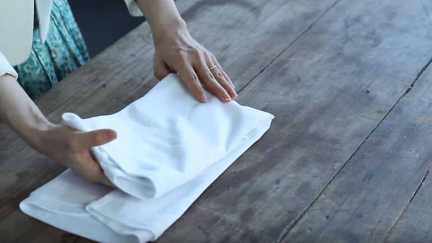 Marie Kondo shows how to properly fold a shirt, camisole