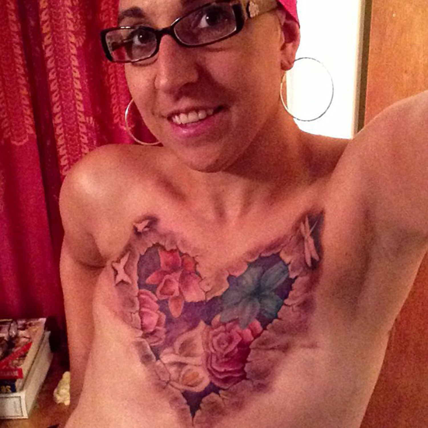 Flat and fabulous': Topless tattoo selfie inspires cancer survivors