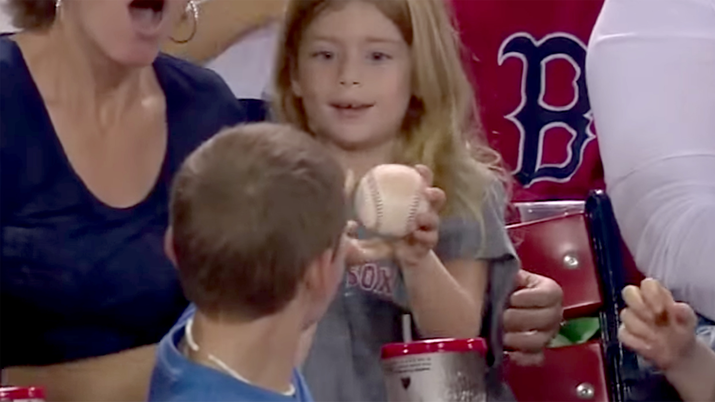 Red Sox fan, 12, gives foul ball to little girl: 'It's good to
