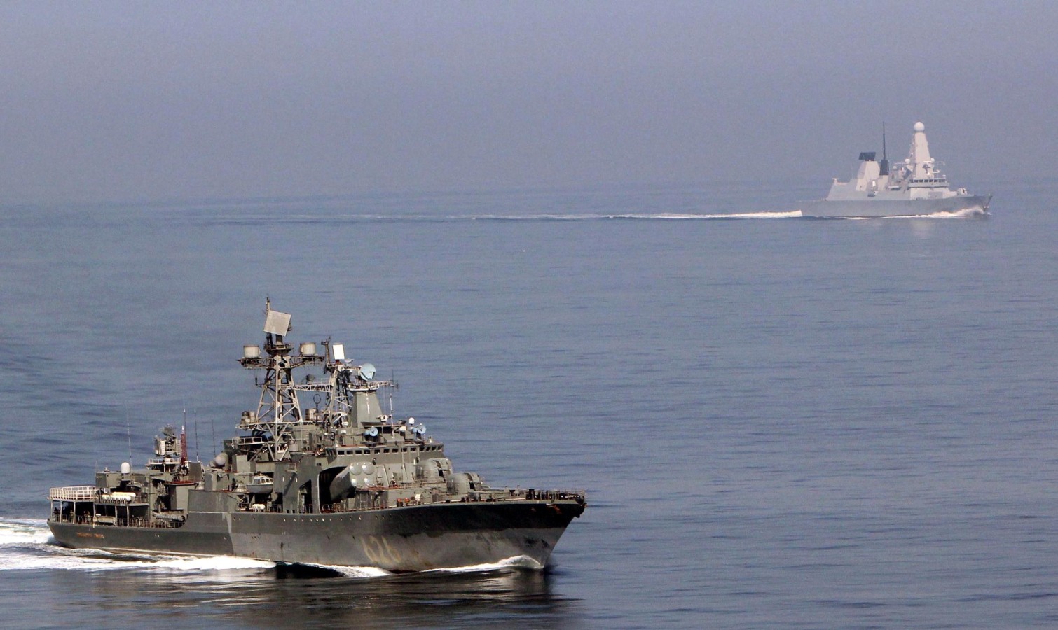 HMS Dragon eyes a Russian destroyer