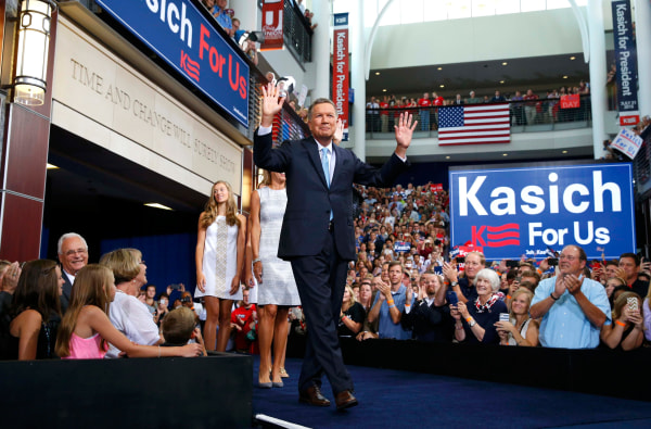 Image: Republican U.S. presidential candidate and Ohio Governor John Kasich arrives on stage to formally announce his campaign for the 2016 Republican presidential nomination during a kickoff rally in Columbus
