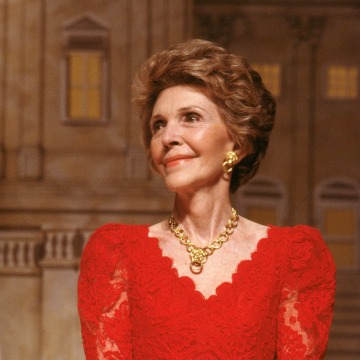 Image: Nancy Reagan, decked out in red lace dress & gold