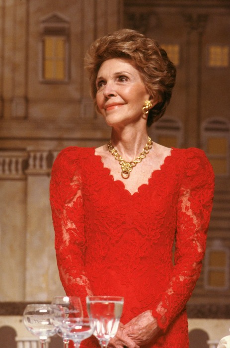 Image: Nancy Reagan, decked out in red lace dress &amp; gold