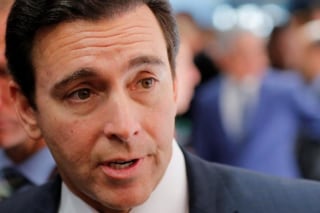 President and CEO of Ford Motor Company Mark Fields speaks with reporters during the media preview of the 2016 New York International Auto Show in Manhattan, New York