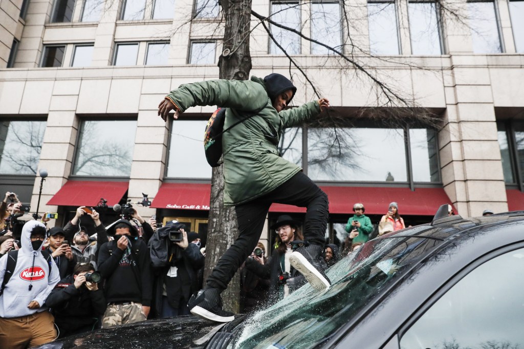 What right does this protester have to destroy someone else's property?