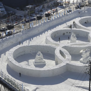 Image: A snow sculpture in the shape of the Olympic rings