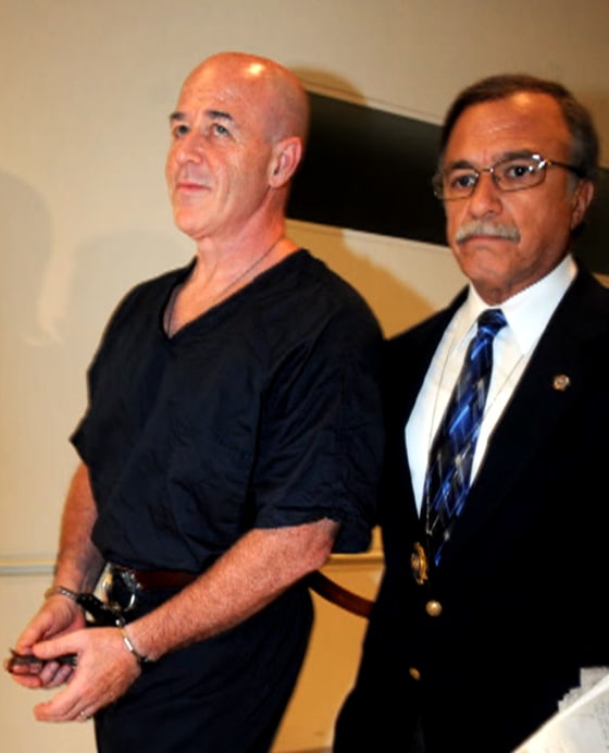 A handcuffed Kerik is led away at the Bronx Hall of Justice after testifying at a perjury trial for two of his former friends. Kerik served time in prison for tax evasion and lying to the White House.