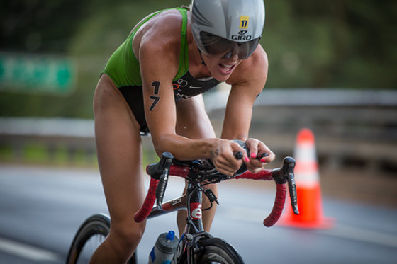 Photo: Jenna Parker competes in the New York City Triathlon in July; she was the first female finisher. . 