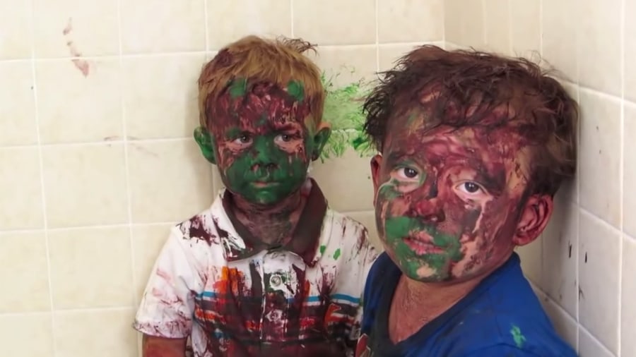 Kids Play With Paint And Get It All Over Their Faces