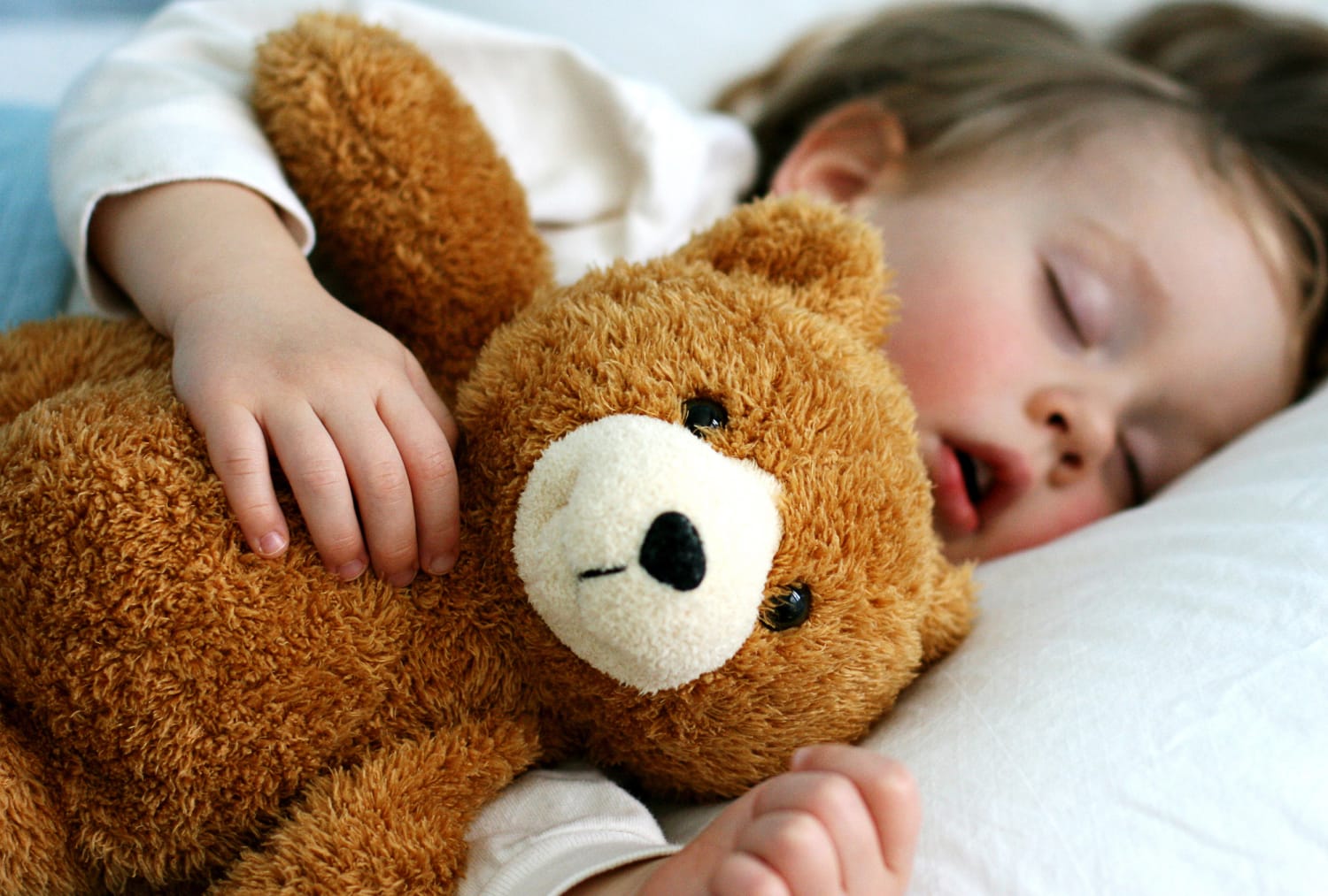 sleeping with teddy bear