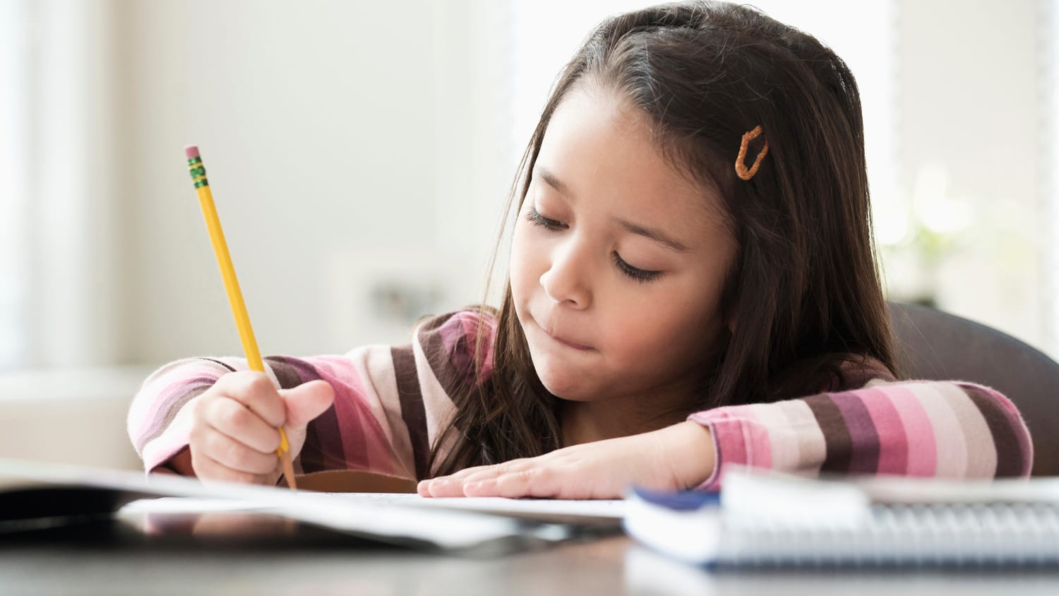 image of kid doing homework