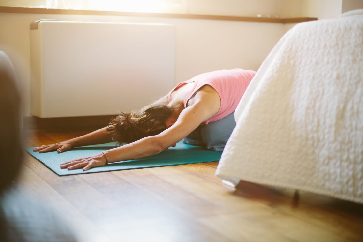 4 gentle exercises that will help ease your hangover symptoms