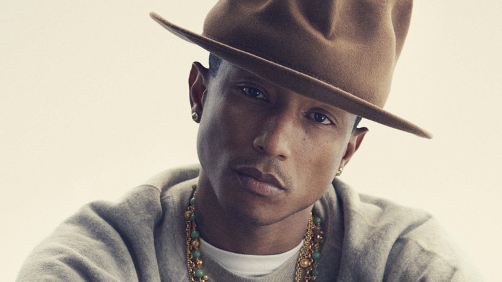 Happy' times! Pharrell Williams signs on to be a 'Voice' coach