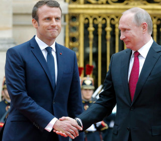 Another Awkward Presidential Handshake: France's Macron Meets Putin