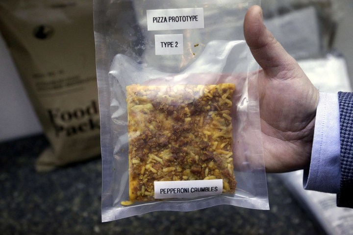 A packet containing a slice of prototype pizza