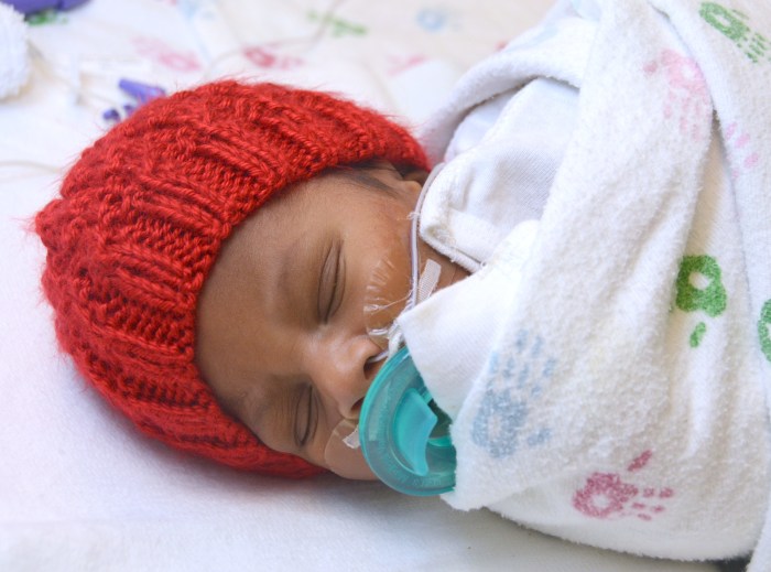 Call for knitters to make hats for babies for American Heart Month