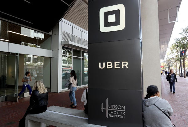 Image: The logo of the ride sharing service Uber is seen in front of its headquarters