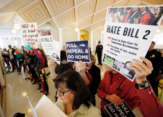 Image: FILE PHOTO - Opponents of North Carolina's HB2 law limiting bathroom access for transgender people protest as the legislature considers repealing the controversial law in Raleigh