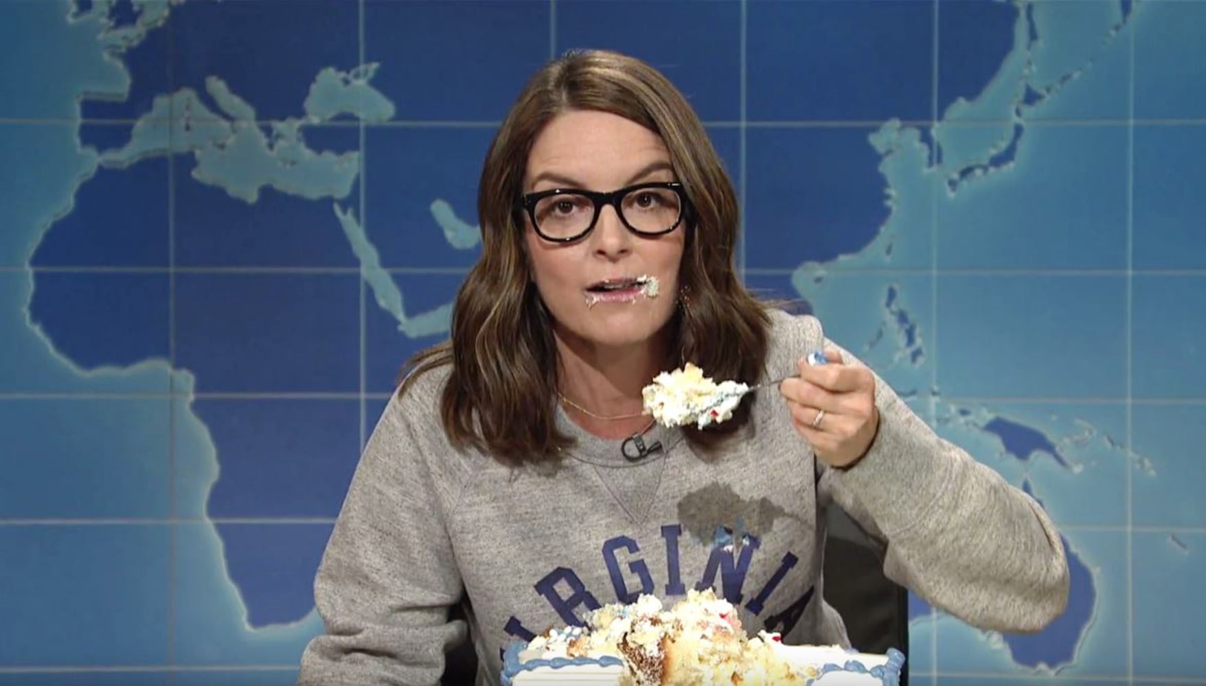 Tina Fey dips a grilled cheese into a cake for the #Resistance