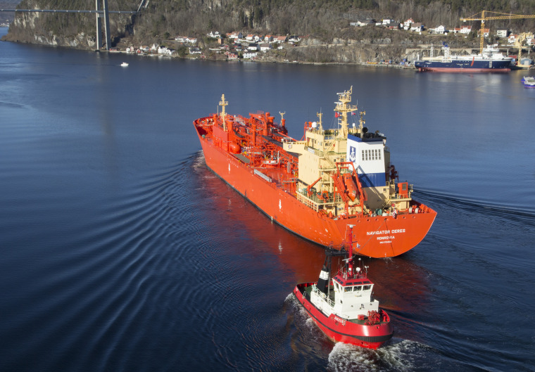 A tugboat pulls the Navigator Ceres in Brevik, Norway on March 20, 2016.
