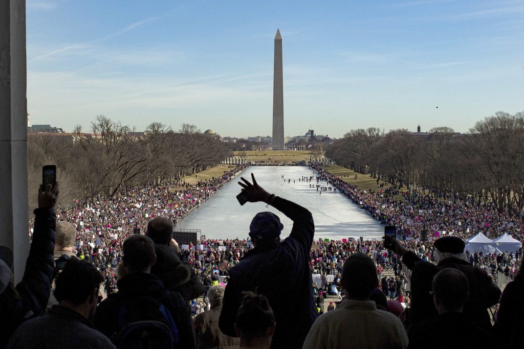 Image: People gather during the Women's March around Lincoln Memorial in Washington, DC, on Jan. 20, 2018 in Washington.