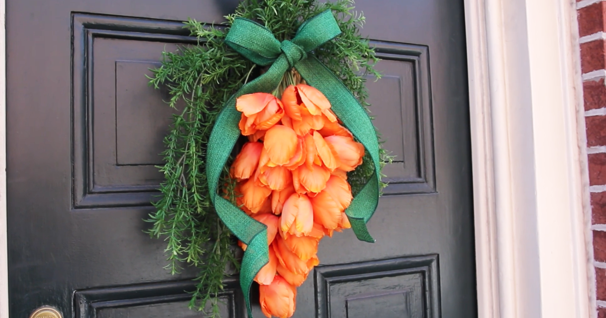 Decorate your door for Easter with this carrot-shaped wreath