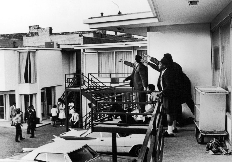 Image: Associates of Martin Luther King Jr. stand on the balcony of the Lorraine Motel moments after his assassination