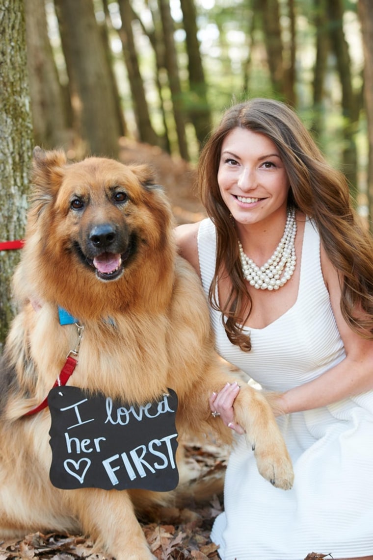 Man shares engagement photo with dog showing "pecking order"