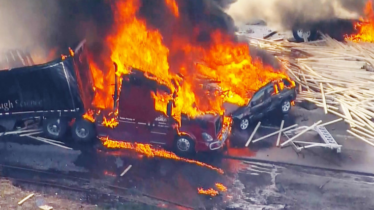 Truck driver in fiery Colorado crash charged with 40