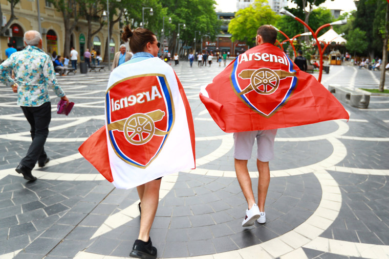 Image: Arsenal fans draped in flags in Baku, Azerbaijan