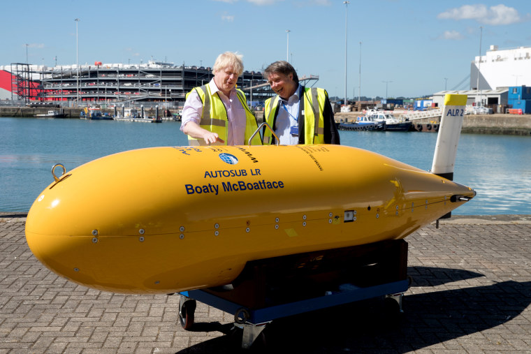 Image: Foreign Secretary Boris Johnson stands with Boaty McBoatface, an autonomous underwater vehicle used for scientific research, in Southampton, England, on June 22, 2018.