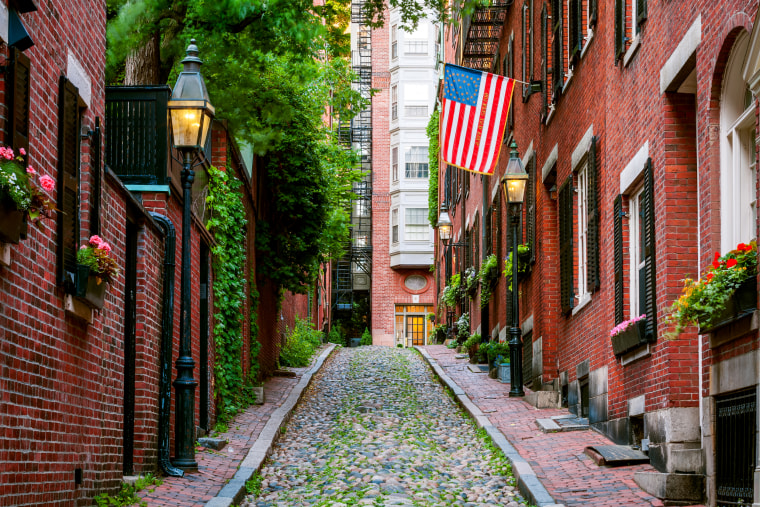 Image: Brick houses along Acorn Street in the Beacon Hill section of Boston.