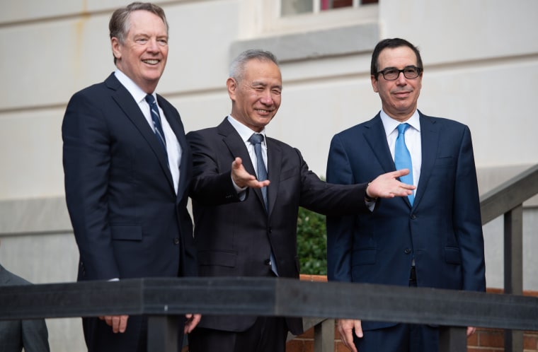 U.S. Trade Representative Robert Lighthizer, left, and Treasury Secretary Steven Mnuchin greet Chinese Vice Premier Liu He as he arrives for trade talks in Washington on Oct. 10, 2019.