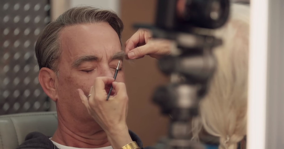 See Tom Hanks transform into Mister Rogers in new clip