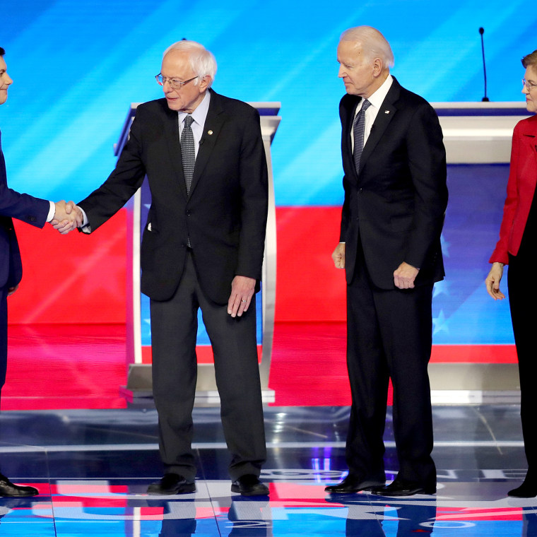 Image: Democratic Presidential Candidates Debate In New Hampshire Ahead Of First Primary Contest