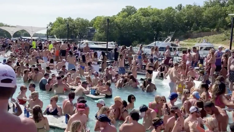 Image: Revelers celebrate Memorial Day weekend at Osage Beach of the Lake of the Ozarks, Missouri