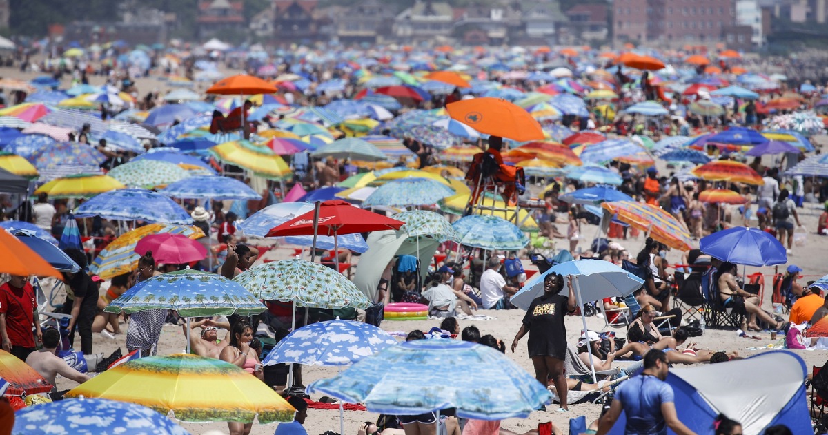 Big crowds celebrated July Fourth as coronavirus cases spike across the country