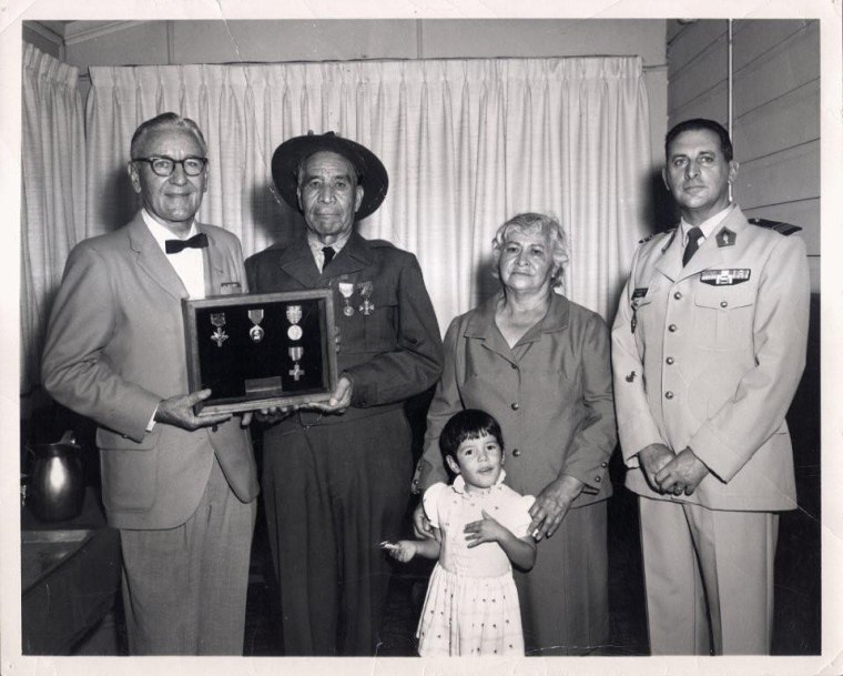 Commander M.R. McKinney, Marcelino Serna, Diana Stopani, Mrs. M. Serna, and Major Bernard L. Mourlevat.