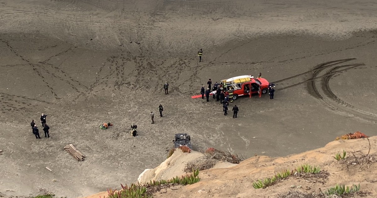 Woman survives after vehicle passes over San Francisco beach cliff