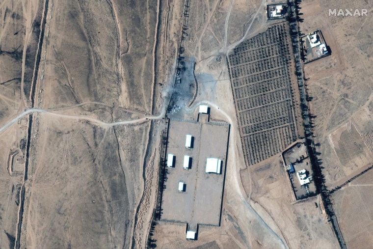 Image: An Iraq-Syria border crossing and destroyed buildings after airstrikes seen on a Feb. 26, 2021 satellite image.