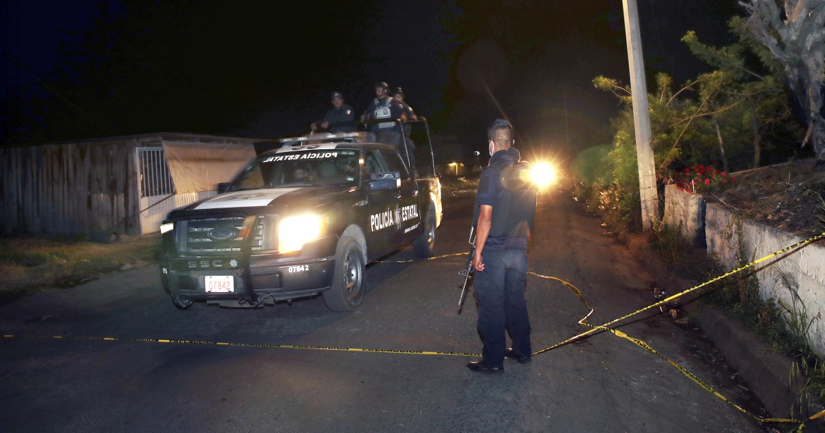 Gunmen drop dead police convoy near Mexico City, killing 13