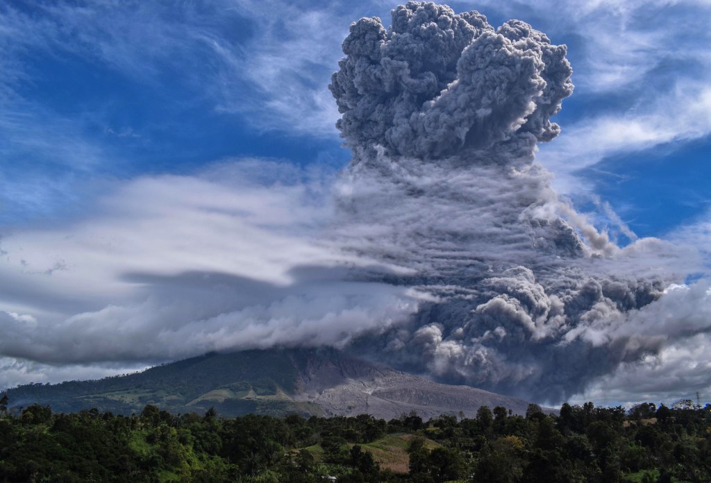 Indonesia S Sinabung Volcano Ejects Towering Column Of Ash