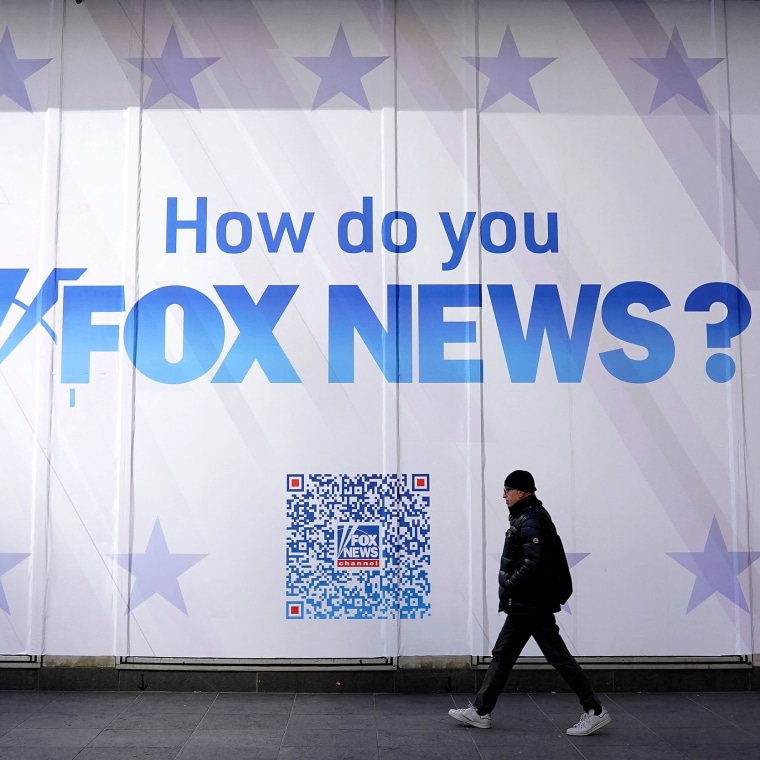 A person walks past the Fox News headquarters in New York City