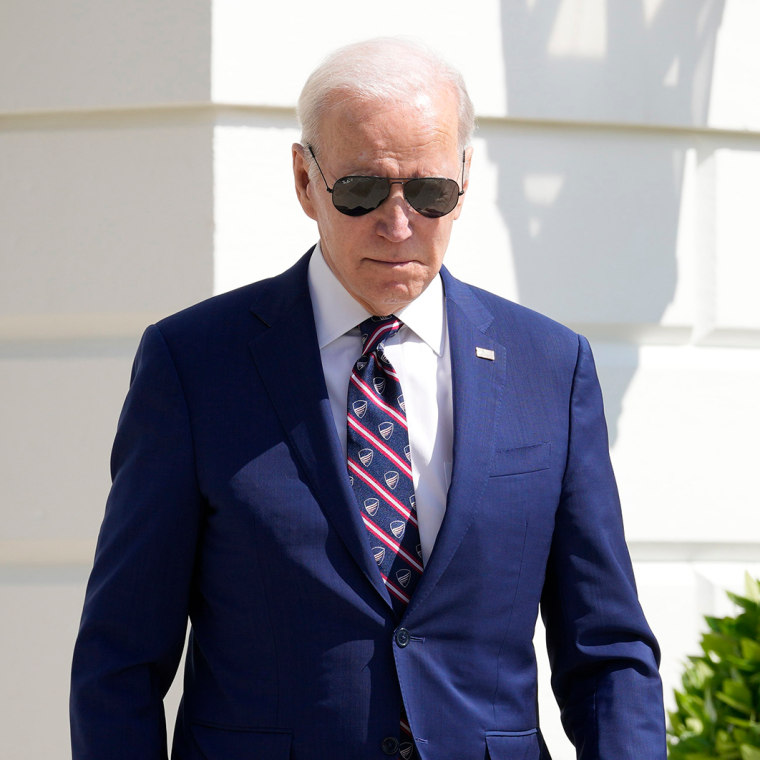 President Joe Biden walks out of the White House in Washington and talks with reporters before boarding Marine One on the South Lawn, Tuesday, March 28, 2023. Biden is heading to North Carolina to visit an expanding semiconductor manufacturer. (AP Photo/Susan Walsh)