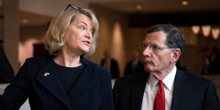 Senator Cynthia Lummis (R-WY) and Senator John Barrasso (R-WY) ride an escalator after the conclusion of an address by Ukrainian President Volodymyr Zelensky, at the U.S. Capitol, in Washington, D.C., on Wednesday, March 16, 2022. Ukrainian President Volodymyr Zelensky addressed American lawmakers today after yesterday addressing the Canadian Parliament, calling for a no fly zone and further military aid.